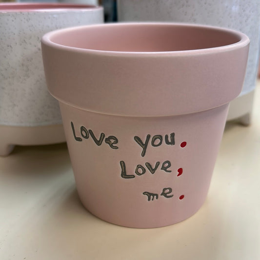 'Love you, Love, Me."  Pot